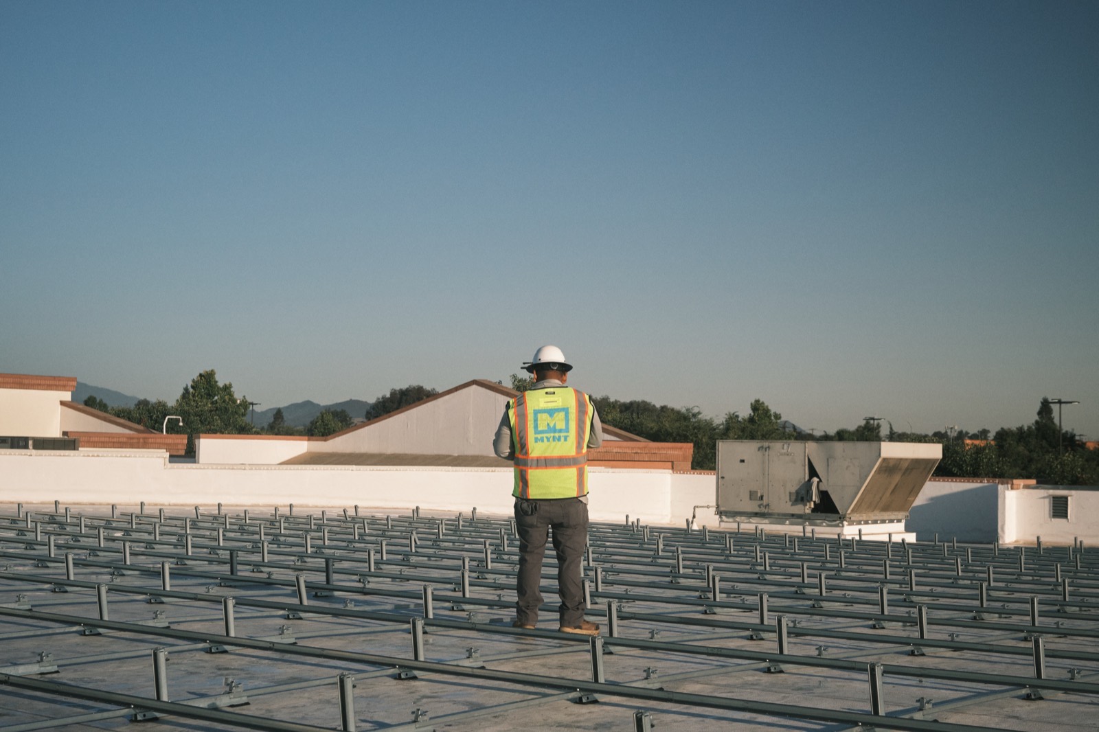MYNT crew setting racking on a California solar project
