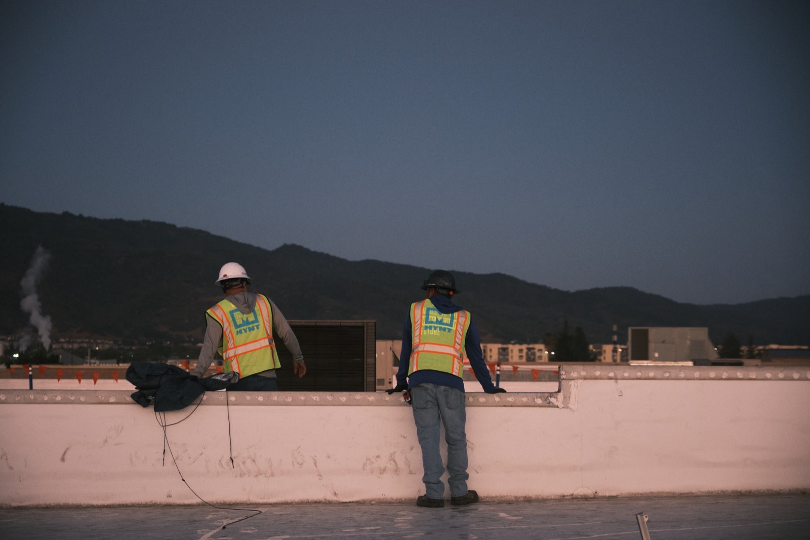 MYNT electrician working on a commercial solar installation