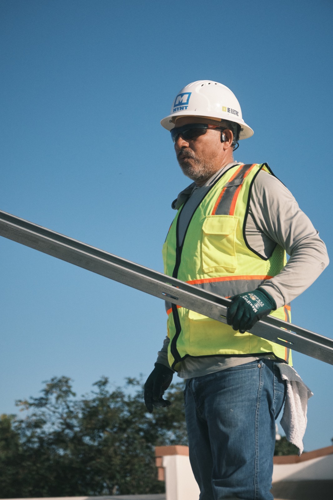 MYNT crew member on site during a solar build