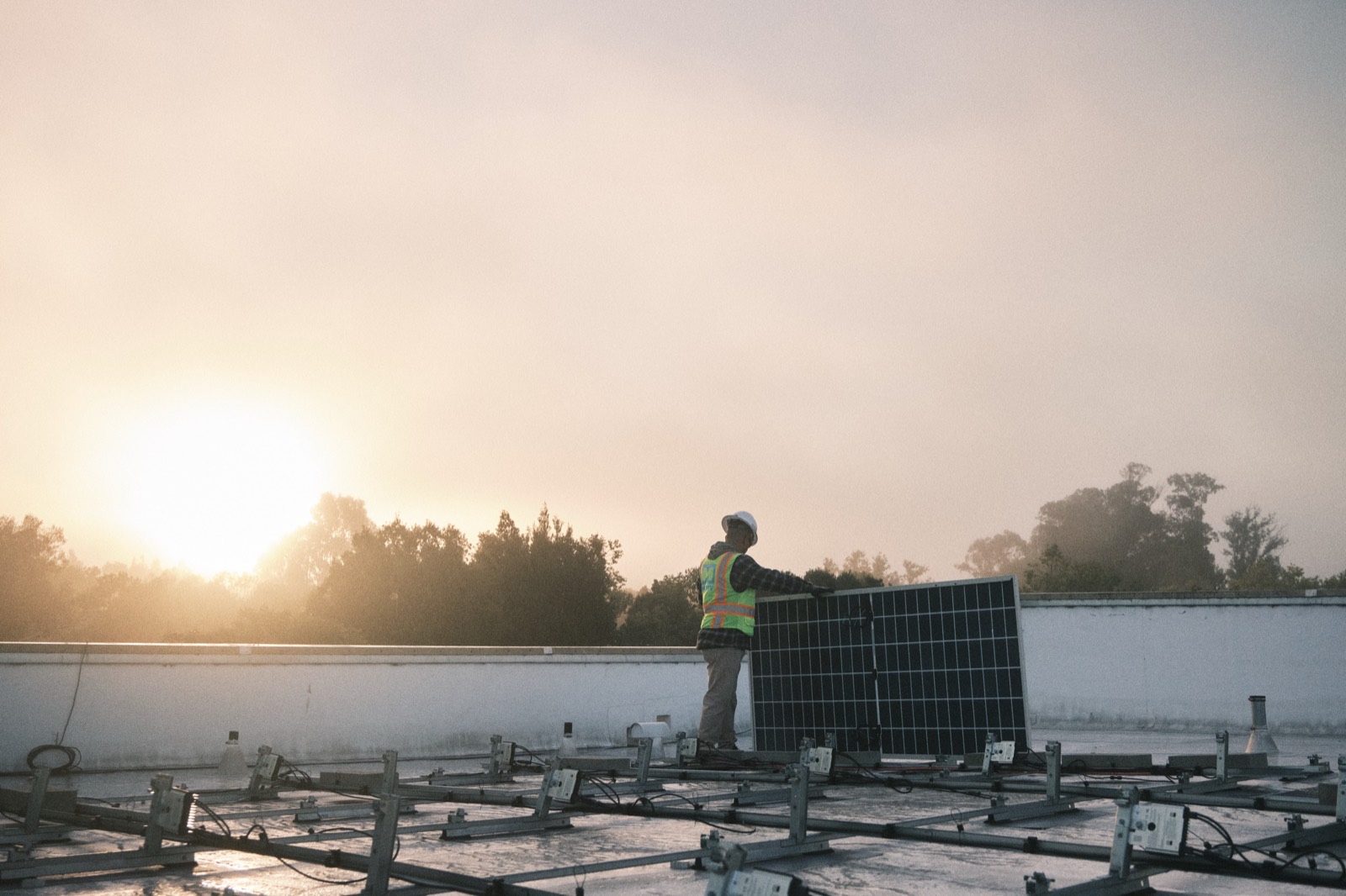 MYNT electrician working on a commercial solar installation