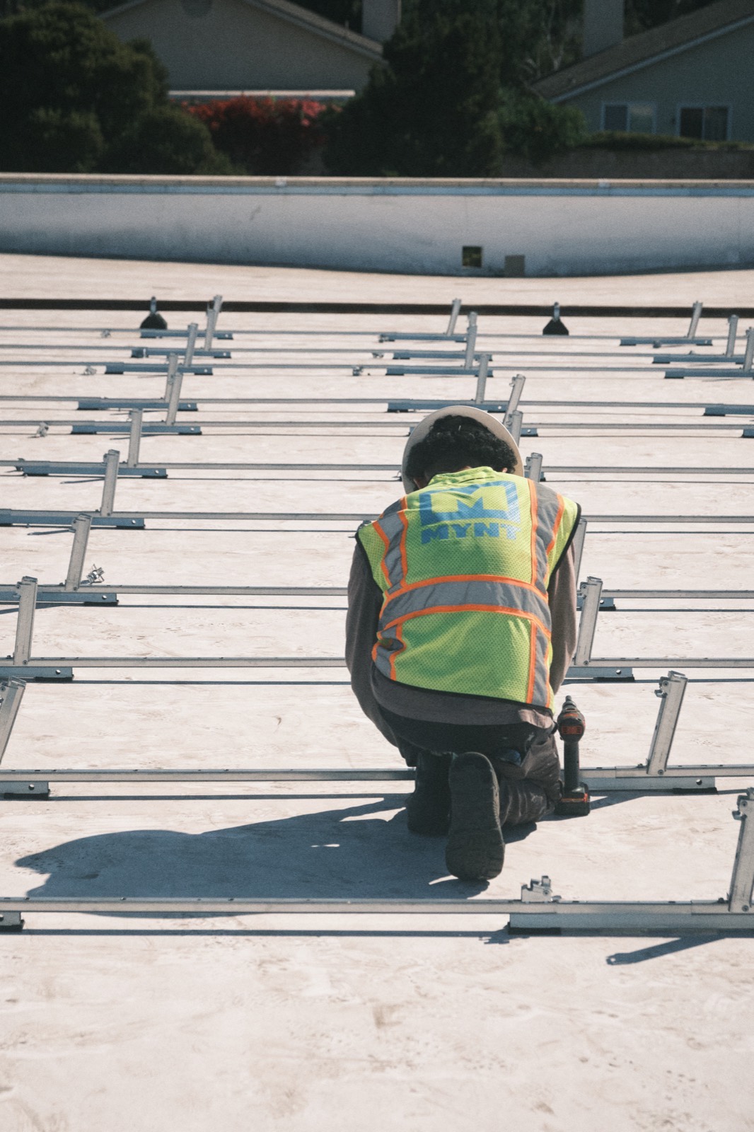 MYNT construction crew working across a solar array