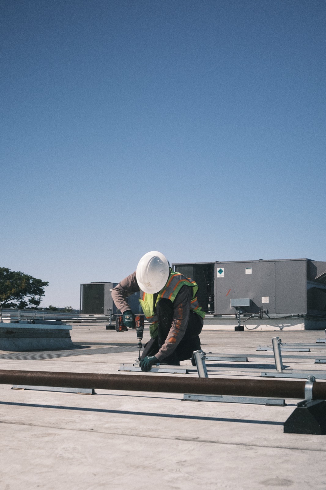 MYNT crew member on site during a solar build
