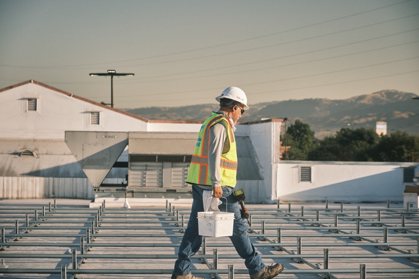 MYNT crew member on site during a solar build